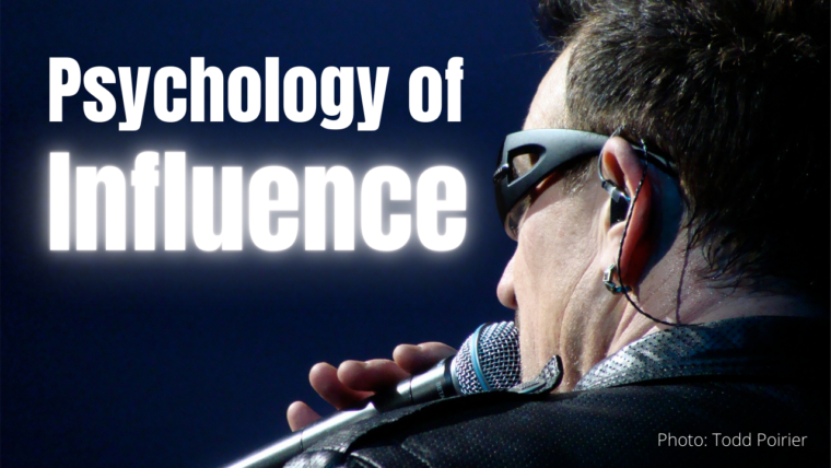Rockstar (Bono of U2) in front of microphone, with the title "Psychology of Influence"
